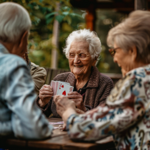 Senior playing cards with friends in the no-go years